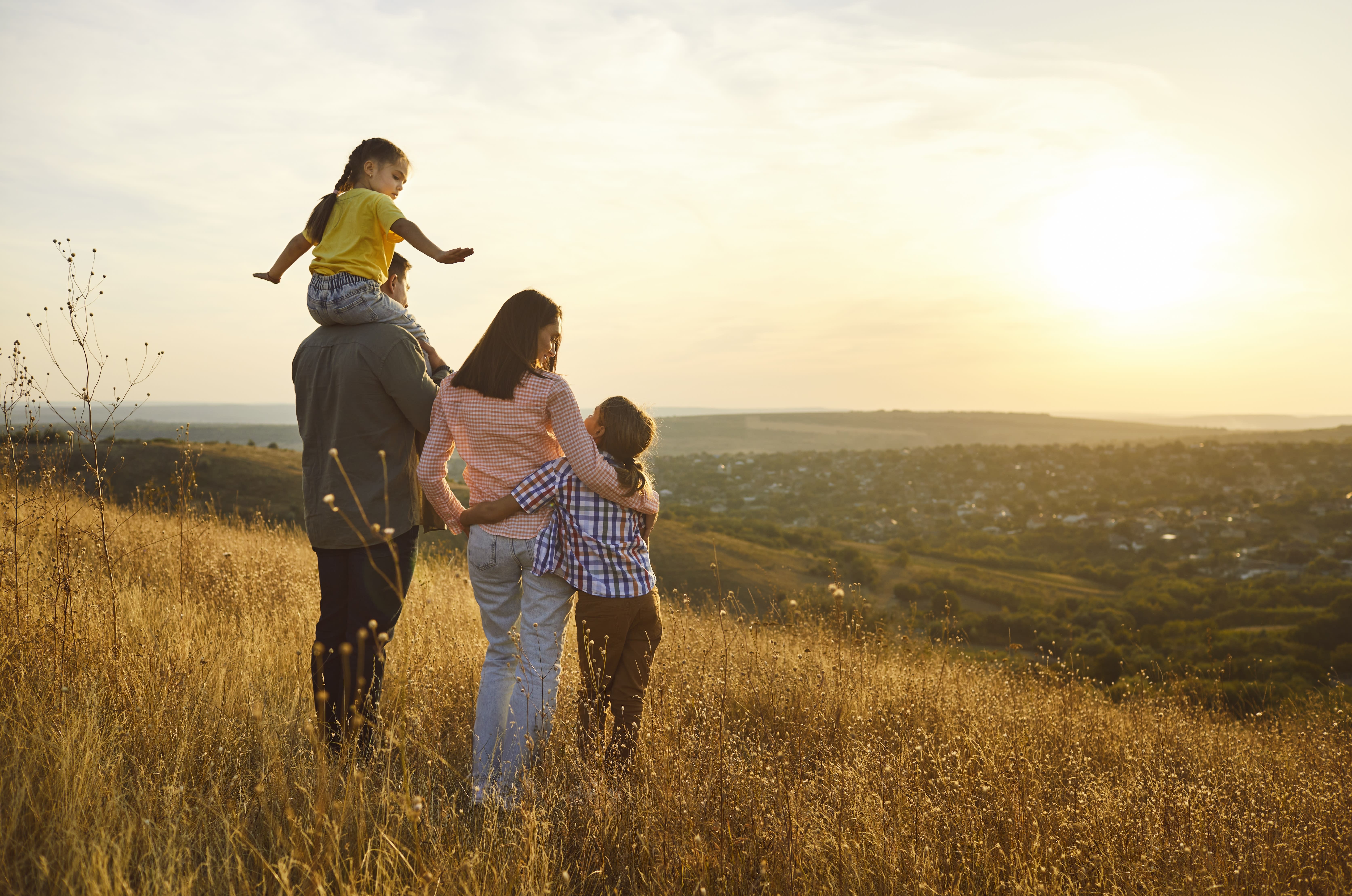 Family together in a sunny meadow